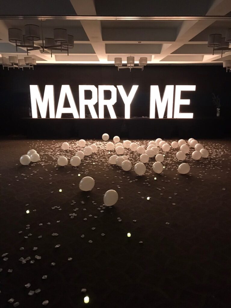 Marry me marquee letter rental with balloon decor service in Hamilton.